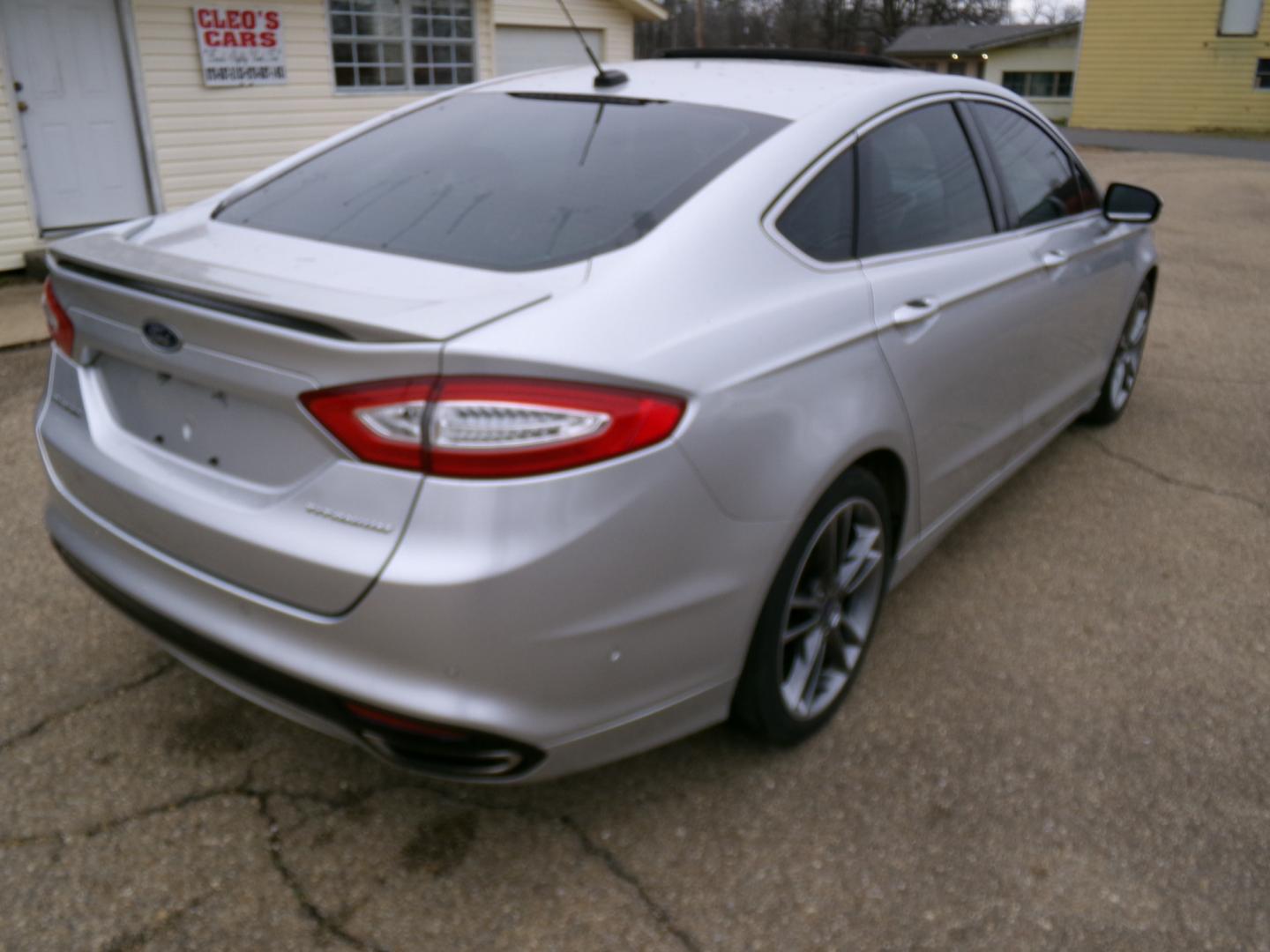 2013 Silver /Black Ford Fusion Titanium (3FA6P0K97DR) with an 2.0L L4 DOHC 16V engine, automatic transmission, located at 401 First NE, Bearden, AR, 71720, (870) 687-3414, 33.726528, -92.611519 - Photo#25